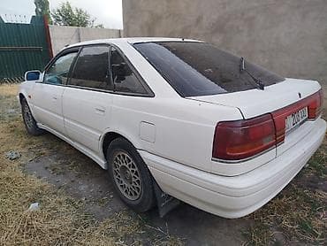 Унаа: Mazda Capella: 1990 г., 2 л, Кол менен иштөөчү, Бензин, Седан — 3