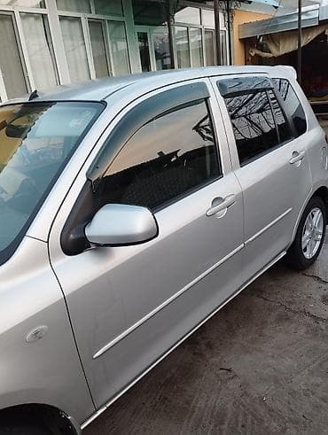 byd plus: Mazda Demio: 2004 г., 1.4 л, Автомат, Бензин, Седан — 1