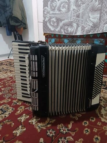 шлемы мото: Акордеон Weltmeister (кнопочно-клавишный) Описание: - Полноразмерный — 6