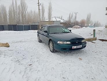 Mazda 626: 1993 г., 1.8 л, Механика, Бензин, Седан