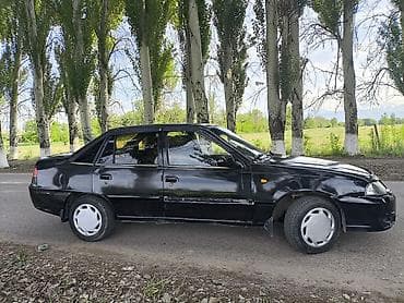 aydi c4: Daewoo Nexia: 2009 г., 1.5 л, Механика, Бензин, Седан — 5