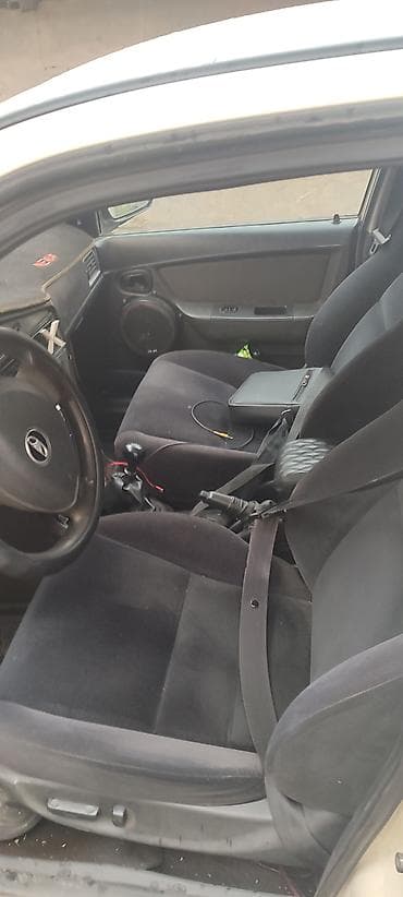 mc 2000: Daewoo Nexia: 2012 г., Механика, Бензин, Седан — 4