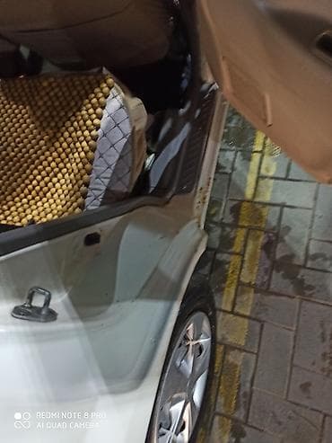 тачки б у: Mazda Demio: 1999 г., 1.4 л, Автомат, Бензин, Минивэн — 10