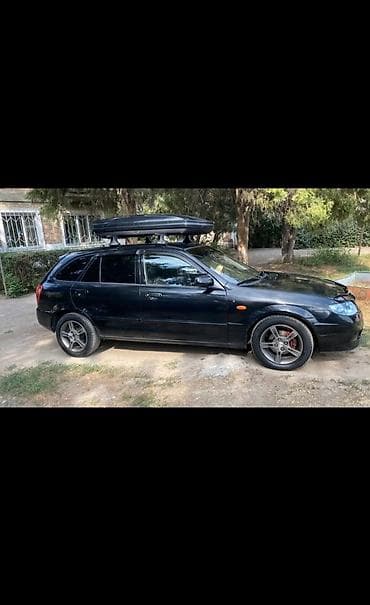 corolla e150: Mazda 323: 2002 г., 1.6 л, Бензин, Хэтчбэк — 6