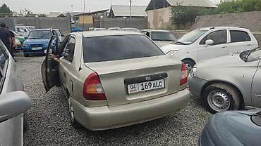 хундай аванте 1: Hyundai Accent: 2002 г., 1.5 л, Кол менен иштөөчү, Седан — 6