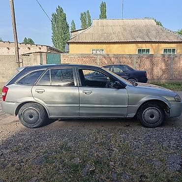глушители авто: Mazda Familia: 1999 г., 1.5 л, Автомат, Бензин, Хэтчбэк — 3