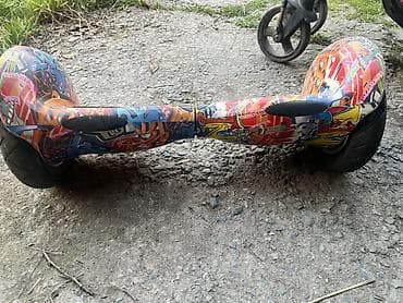 беговых дорожка: Гироскутер с ярким граффити-принтом. Особенности: - Диаметр колес — 2