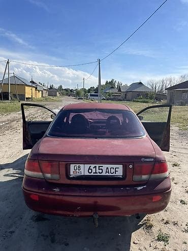 кызыл бирдик: Mazda 626: 1992 г., 1.8 л, Кол менен иштөөчү, Бензин, Седан — 1