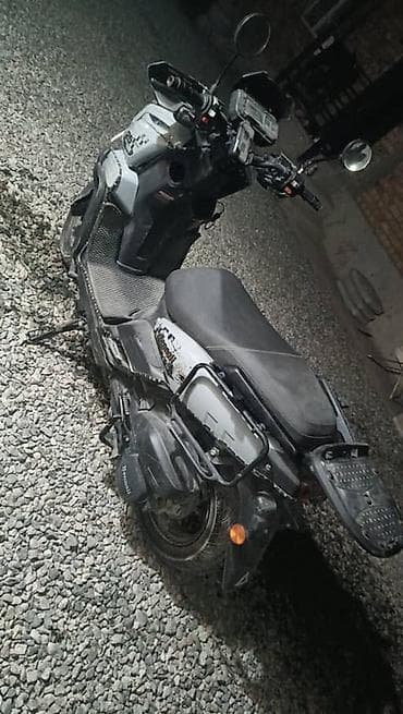 продам скутер: Скутер-эндуро 125 куб. см (надпись «125» на борту) — 1