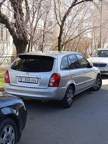 на мазда кронос: Mazda 323: 2003 г., 1.6 л, Автомат, Бензин, Хэтчбэк — 10