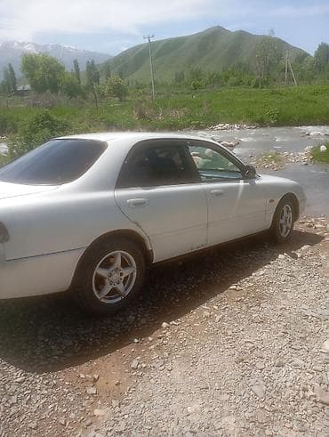 tesla p40: Mazda 626: 1992 г., 1.8 л, Механика, Бензин, Седан — 7