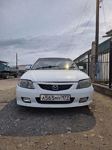 Mazda Familia: 2002 г., Бензин, Седан
