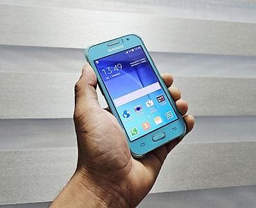 Samsung Galaxy J1, Б/у, 4 ГБ, цвет - Голубой, 2 SIM