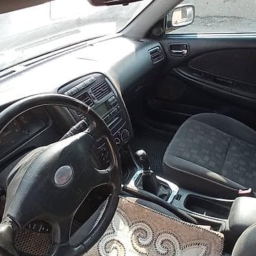 corolla runx: Toyota Avensis: 2001 г., Седан — 6