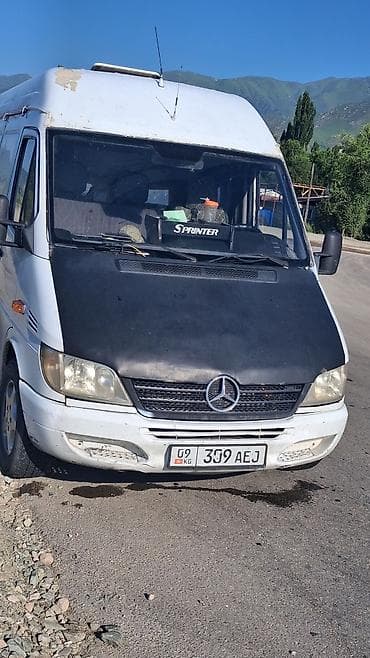 Унаа: Mercedes-Benz Sprinter (W903) — белый микроавтобус/фургон. Основные — 1