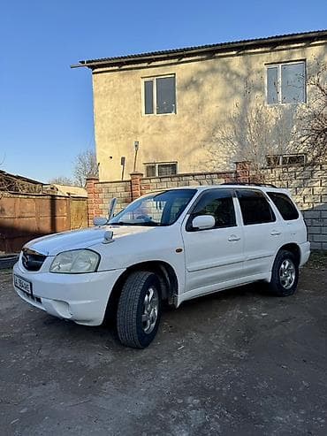 2 9тд: Mazda Tribute: 2003 г., 2 л, Автомат, Бензин, Кроссовер — 5