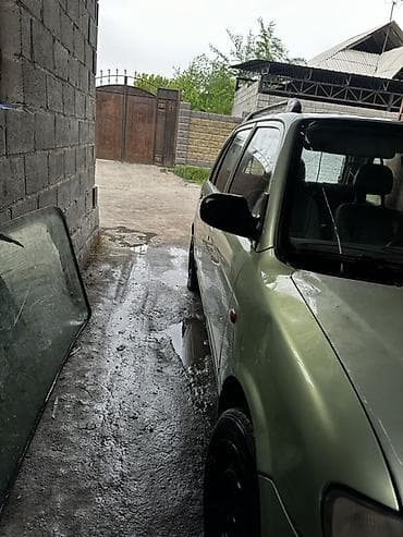 мицубиси спайс стар: Daihatsu Cuore: 2001 г., 1 л, Механика, Бензин, Хэтчбэк — 4