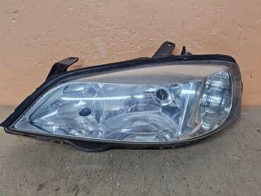 запчасти на опель зафира б: Передняя левая фара Opel 1999 г., Б/у, Оригинал, Германия — 2