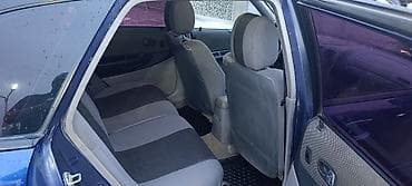 fit 2 2011: Mazda 323: 2003 г., 1.6 л, Механика, Бензин, Хэтчбэк — 7