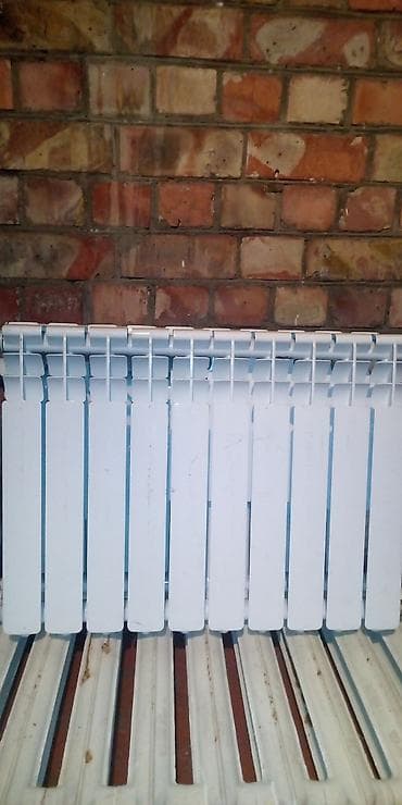 металлическая вешалка для одежды: Биметаллический радиатор отопления, секционный. Описание: - Тип — 1