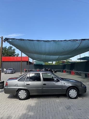 uz fe: Daewoo Nexia: 2012 г., Механика, Седан — 3