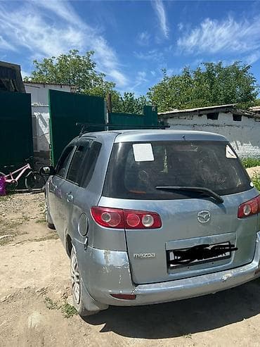 авто чихол: Mazda Demio: 2004 г., Автомат, Бензин, Хэтчбэк — 3