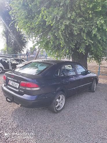Продажа авто: Mazda 626: 1997 г., 2 л, Механика, Бензин, Седан — 6