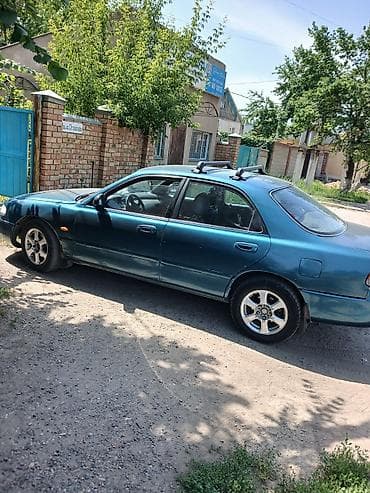мереке авто слив: Mazda Cronos: 1993 г., 2 л, Автомат, Бензин, Седан — 4