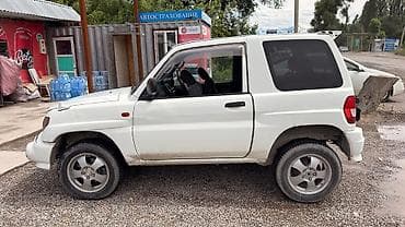 Транспорт: Mitsubishi Pajero iO: 1998 г., 1.8 л, Механика, Бензин, Внедорожник — 6