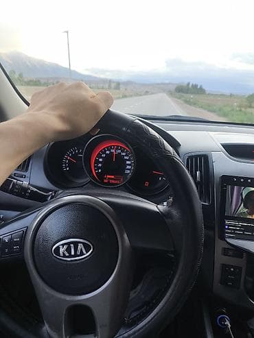 1: Kia Cerato: 2010 г., 1.6 л, Автомат, Бензин, Седан — 9