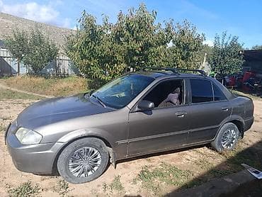 купить моторную лодку: Mazda Familia: 2001 г., Автомат, Седан — 2