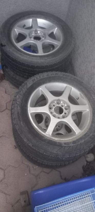 Комплект из 4 колес в сборе: литые диски + зимние шины Bridgestone