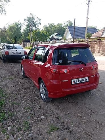 противен: Mazda Demio: 2003 г., 1.5 л, Автомат, Бензин, Хэтчбэк — 4