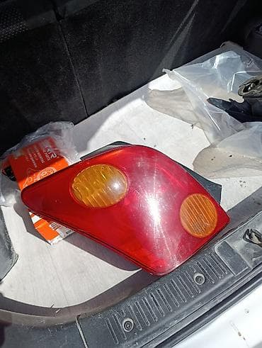 Задний фонарь (левый) для Tayota ist - Оригинальная оптика, корпус под