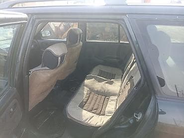 заглушка диска: Mazda Capella: 1998 г., 1.8 л, Механика, Бензин, Универсал — 4