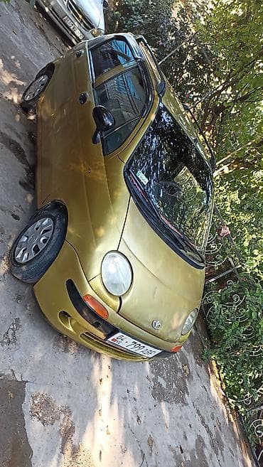 демио багаж: Daewoo Matiz: 2002 г., 0.8 л, Механика, Бензин, Хэтчбэк — 10