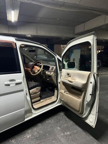 обзор электроскутер а: Nissan Serena: 2003 г., 2 л, Вариатор, Газ, Минивэн — 8