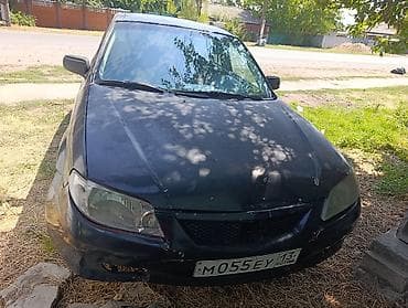 Mazda 323: 1998 г., Хэтчбэк — 4
