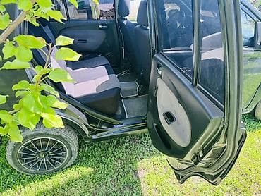 100 с4: Daihatsu Cuore: 2004 г., 1 л, Ручные, Бензин, Хэтчбэк — 6