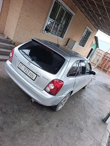 Mazda 323: 2003 г., 1.6 л, Автомат, Бензин, Универсал