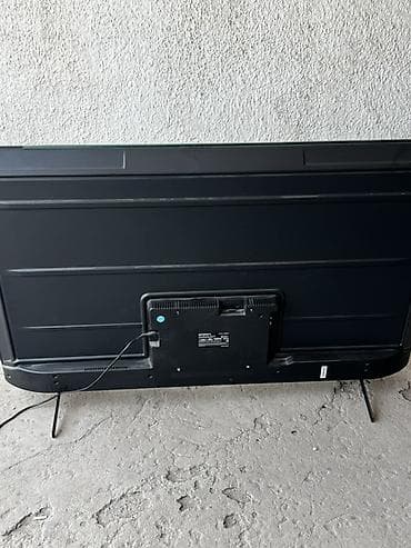 xbox 360 e: Телевизор с плоским экраном, диагональ ориентировочно 55–65". - — 1