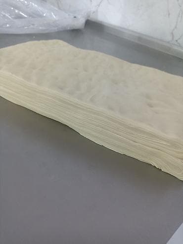 Азык-түлүктөр: Слоенное тесто на заказ.Отличный вкус.200 сом за кг.Находимся в районе — 2