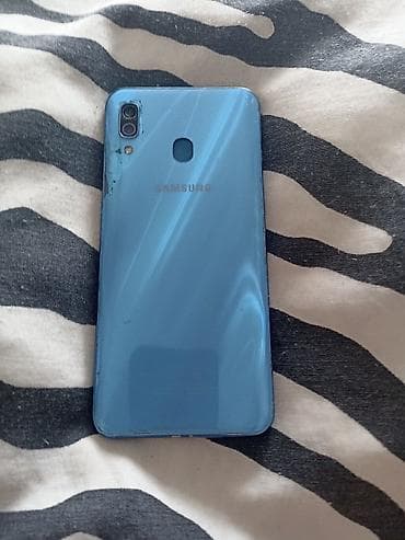 lg v10: Samsung Galaxy A30, Б/у, 64 ГБ, цвет - Синий, 2 SIM — 1