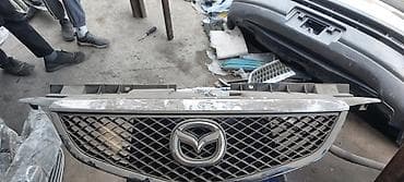 mini v: Решетка радиатора Mazda Оригинал — 6