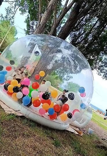 Прозрачный надувной купол-аттракцион с шарами - Большая прозрачная