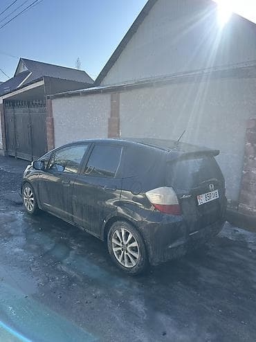 форд фокус 1: Honda Jazz: 2009 г., 1.4 л, Робот, Бензин, Хэтчбэк — 4