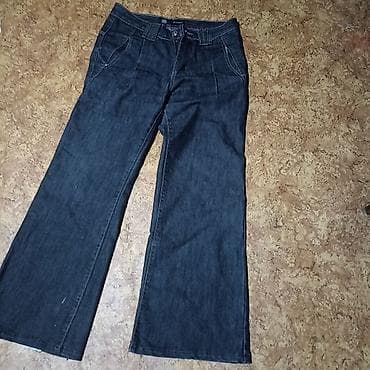 Темно-синие женские джинсы Ridalin размера 29 с расклешенными at lalafo.kg Темно-синие женские джинсы Ridalin размера 29 с расклешенными