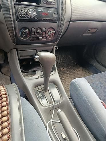 продаю с: Mazda 323: 2001 г., 1.6 л, Автомат, Бензин, Универсал — 6