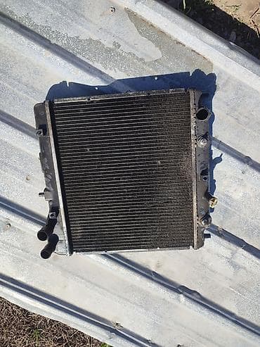 руль фикса: Радиатор охлаждения двигателя Honda Fit б/у короткий — 1