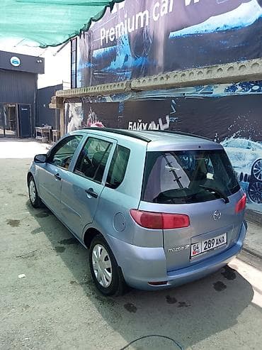 матор на демио: Mazda 2: 2004 г., 1.2 л, Механика, Бензин, Хэтчбэк — 4